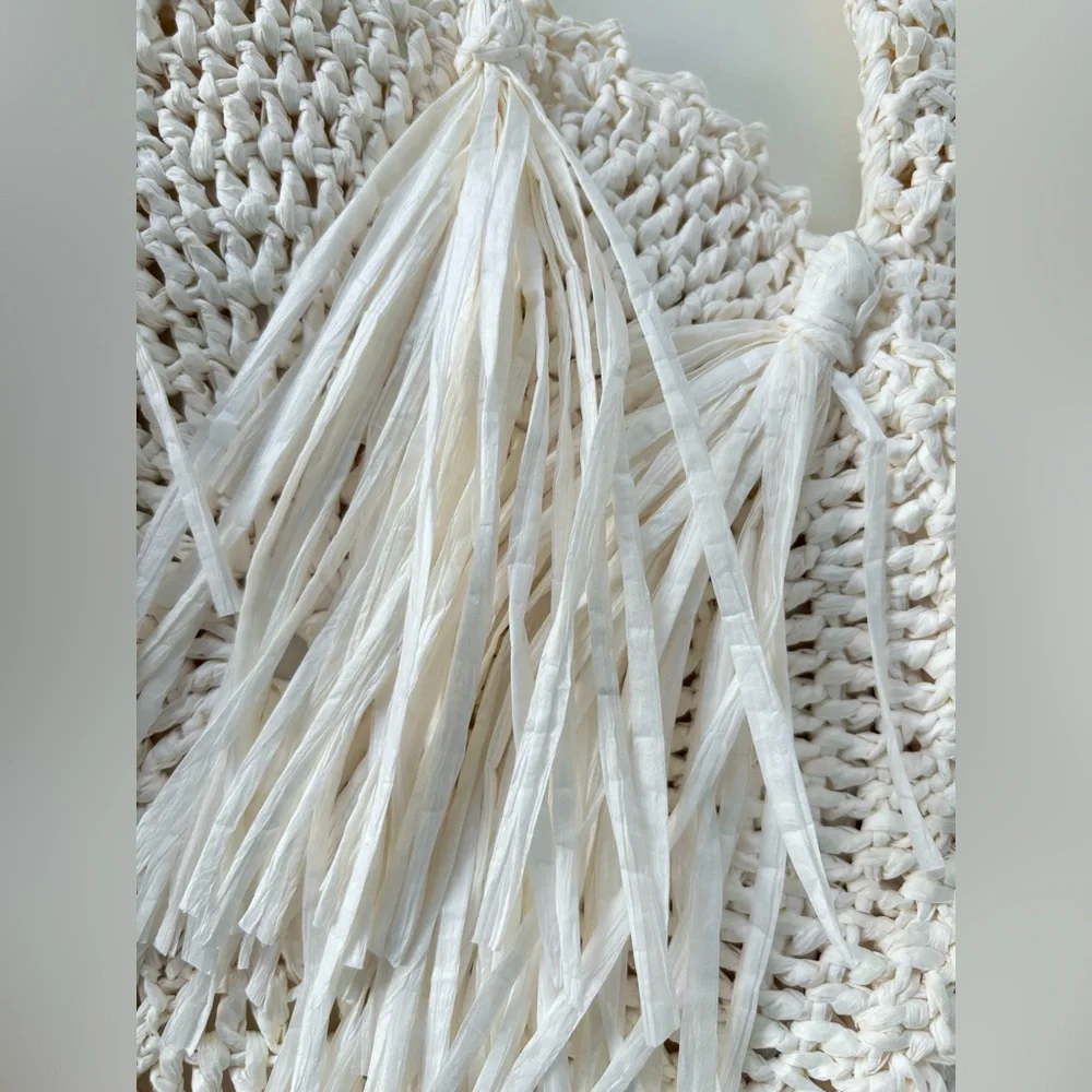 Light Beige Round Straw Fringe Bag Never Used. Beautiful bag